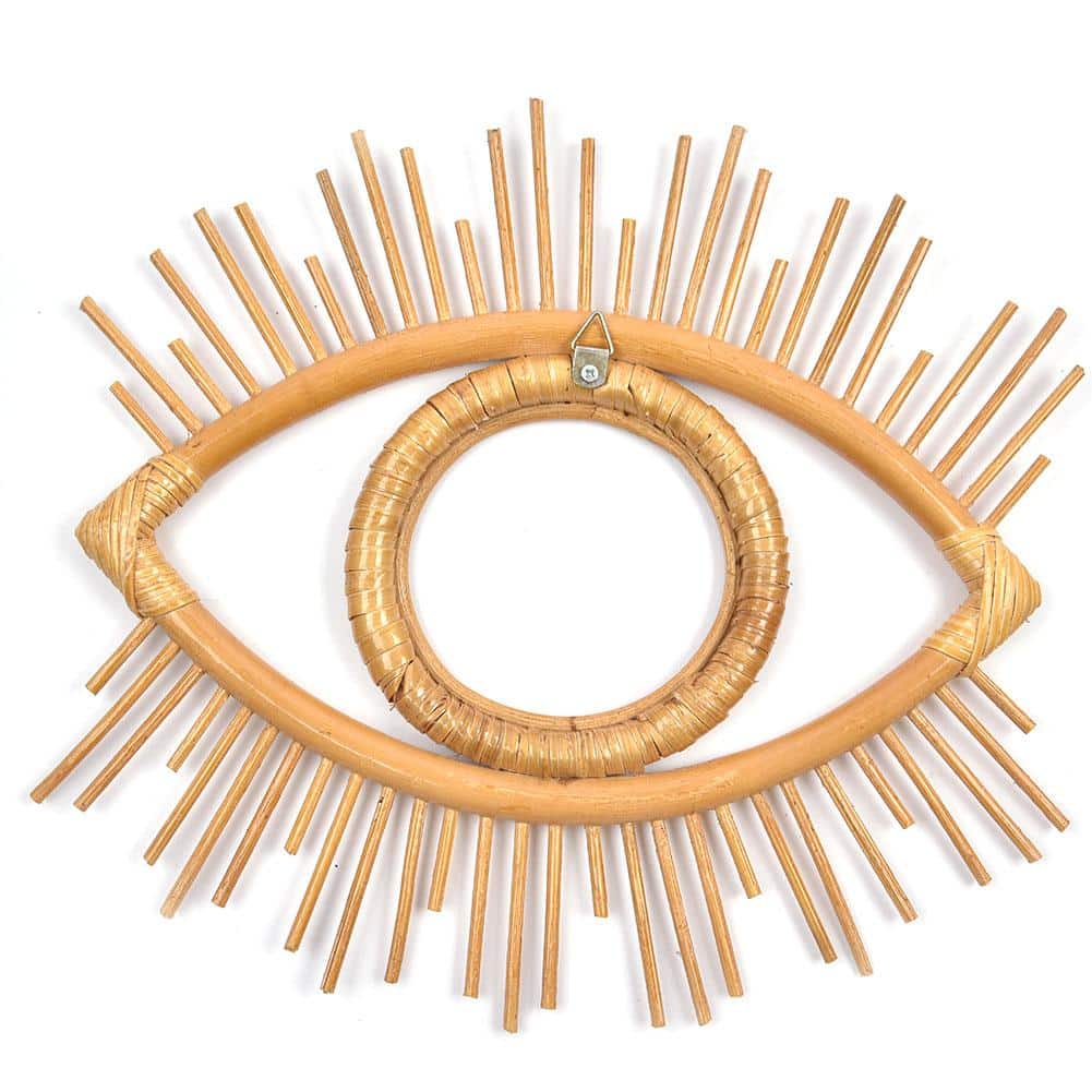 Open rattan eye shaped wall frame with rays