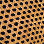 Honey toned hand woven rattan handbag with varnished wooden handles and a drawstring