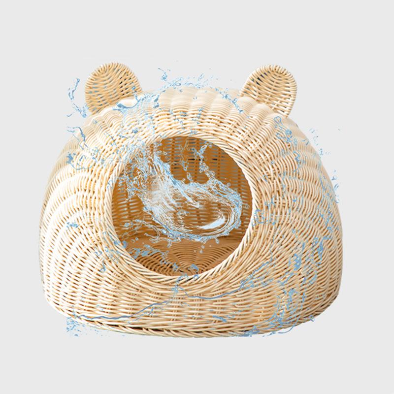 Beige cat bed in molded plastic with a woven rattan look