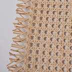 Square sheet of brown plastic cane webbing with a woven rattan look