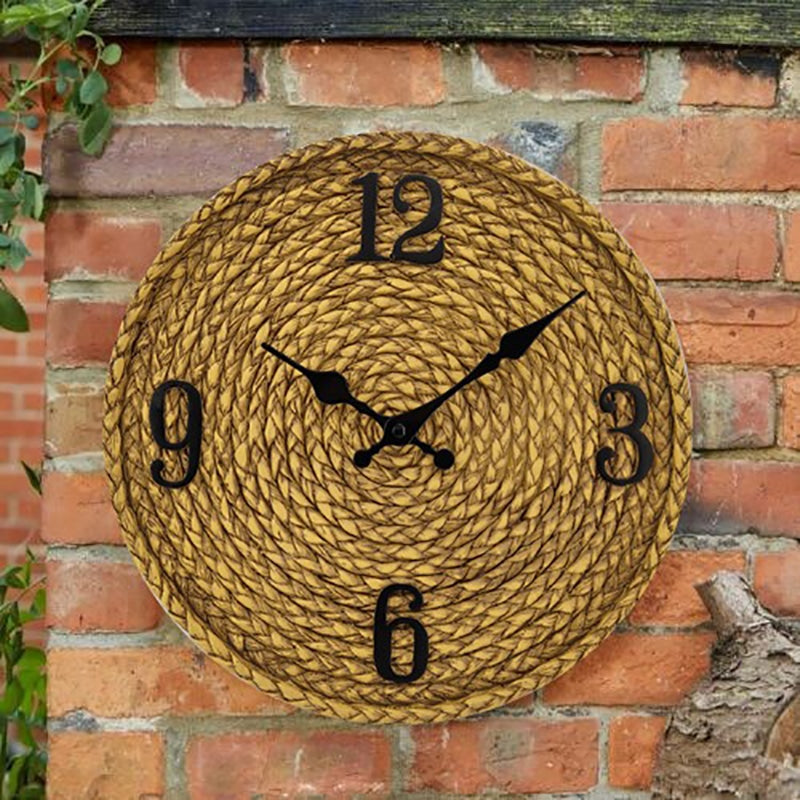 Round woven look resin wall clock with large black numbers