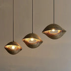 Brown shell shaped chandelier in rattan look metal