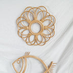 Open rattan flower wall frame with looped petals