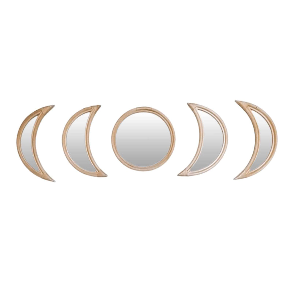 Row of rattan framed mirrors shaped as moon phases