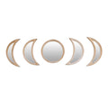 Row of rattan framed mirrors shaped as moon phases