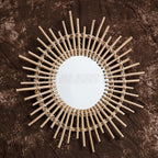 Rattan sun mirror with star shaped rays