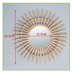 Rattan sun mirror with star shaped rays