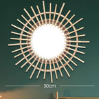 Rattan sun mirror with double ring of rays
