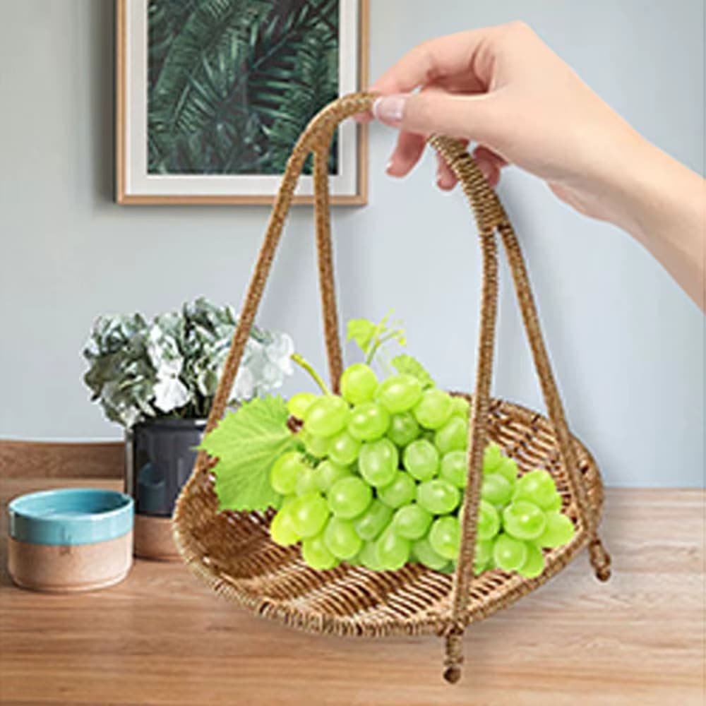 Rattan tiered basket stand with a carrying handle on a patio table