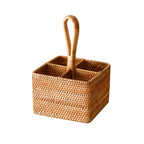 Round and square rattan utensil holders with wooden spoons