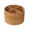 Round and square rattan utensil holders with wooden spoons