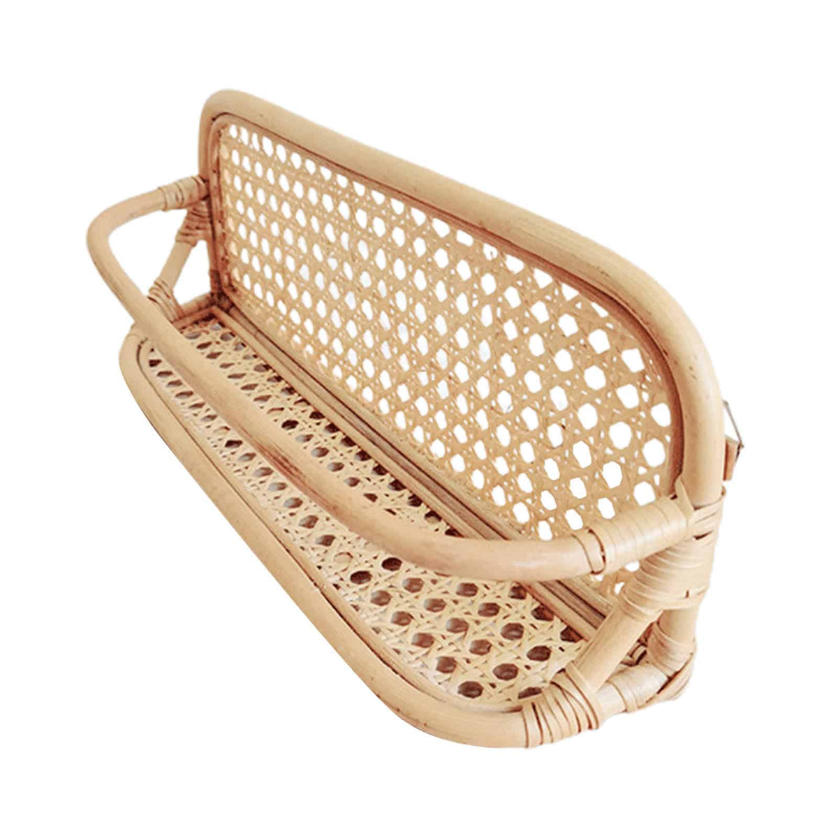 Hand woven rattan wall rack with metal coat hooks in a warm beige