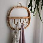 Rounded rectangle rattan wall coat rack with three hand woven hooks