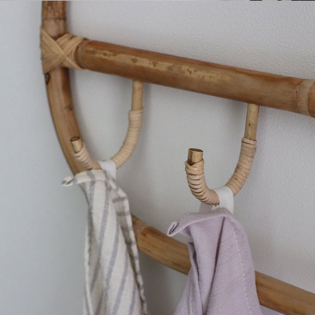 Rounded rectangle rattan wall coat rack with three hand woven hooks