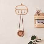 Rounded rectangle rattan wall coat rack with three hand woven hooks