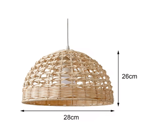Handwoven rattan and wicker dome lamp shade hung over a table