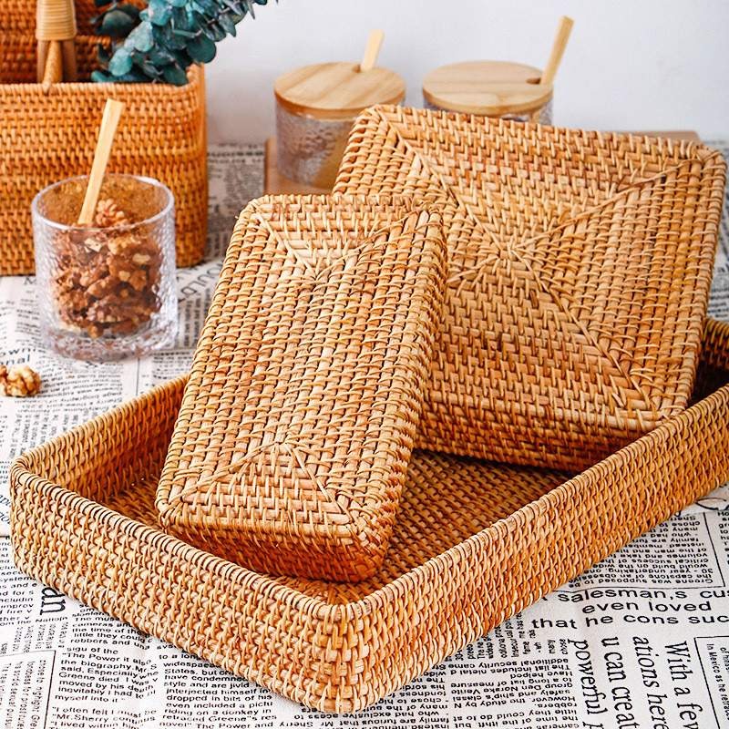 Rectangular honey rattan tray baskets on a table