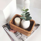 Rectangular honey rattan baskets holding bathroom products