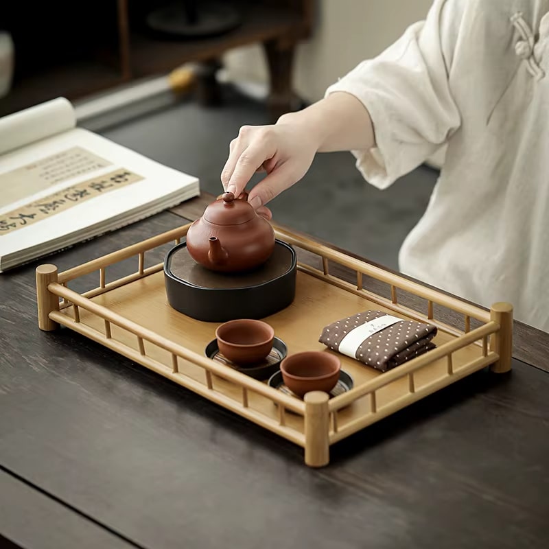 Rectangular handwoven bamboo tray with raised edges