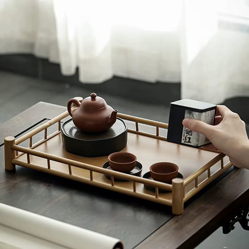 Rectangular handwoven bamboo tray with raised edges