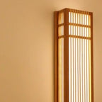 Rectangular wall sconce hand woven in natural rattan