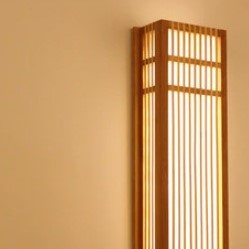 Rectangular wall sconce hand woven in natural rattan