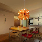 Round pendant light made of fine natural wood and bamboo slats
