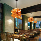Round pendant light made of fine natural wood and bamboo slats