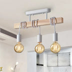 Retro American pendant light with a natural wood frame and patinated metal