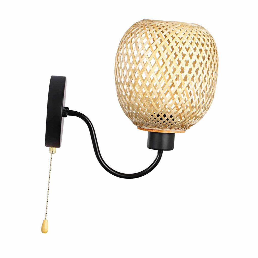 Retro wall sconce with a hand woven bamboo shade on a curved black iron arm