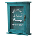 Retro blue wooden key box with a hinged door and hooks inside
