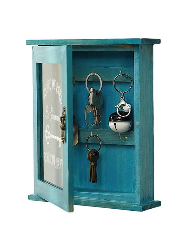 Retro blue wooden key box with a hinged door and hooks inside
