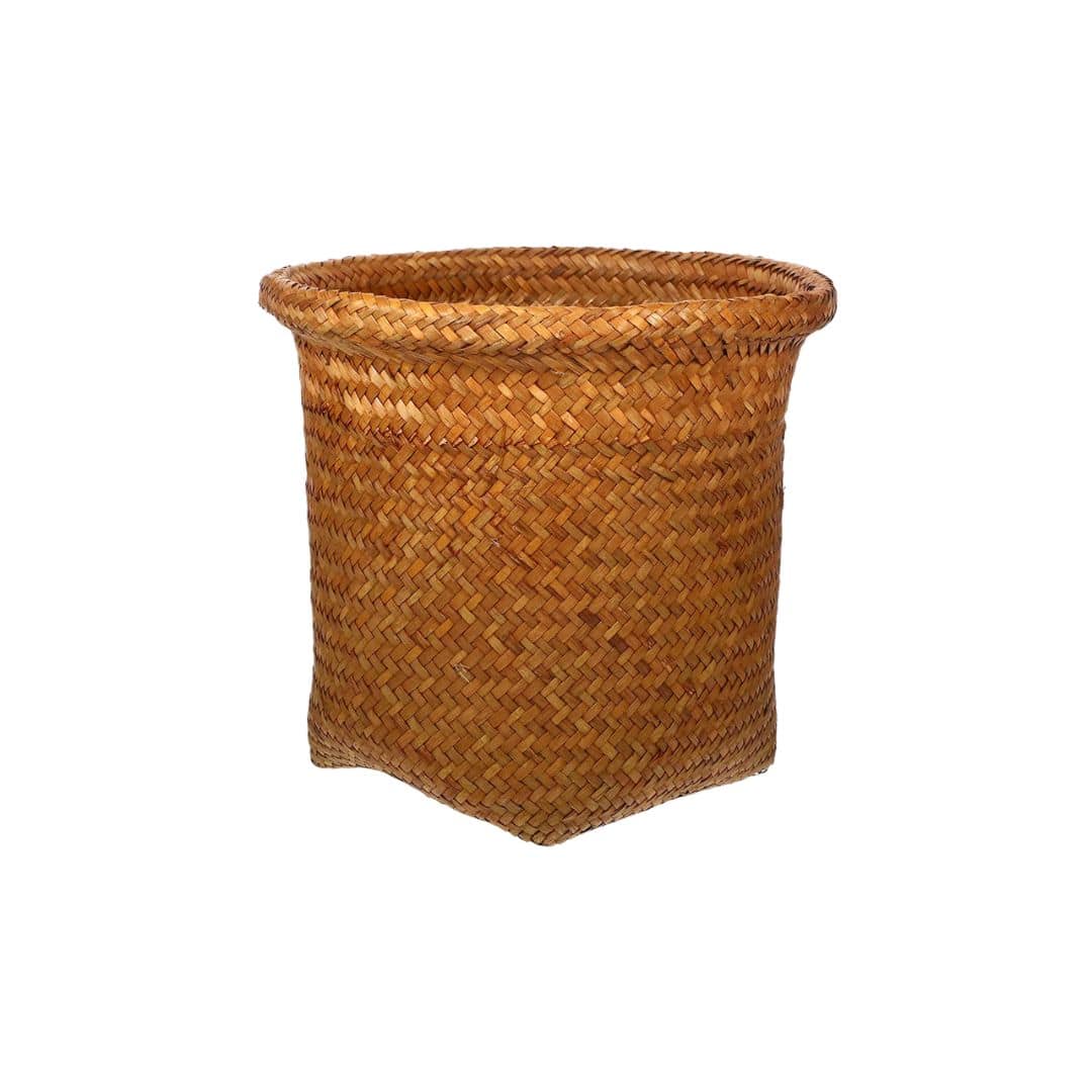 Oval brown rattan wastebasket with a tight retro weave
