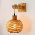 Retro wall sconce with a hand woven rattan shade on a wooden arm