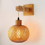Retro wall sconce with a hand woven rattan shade on a wooden arm