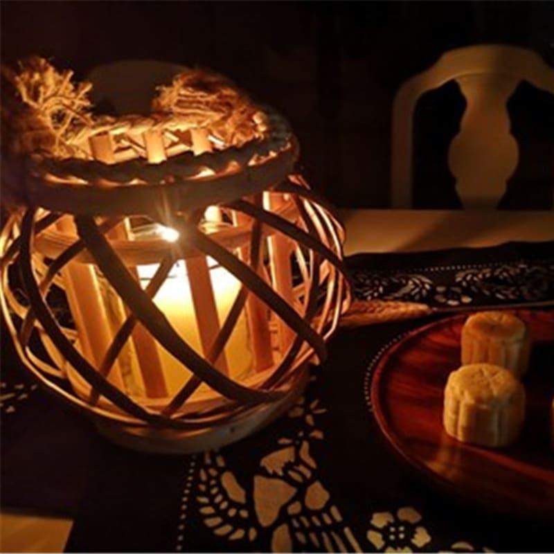 Square retro hand woven rattan lantern with a spiral woven rope