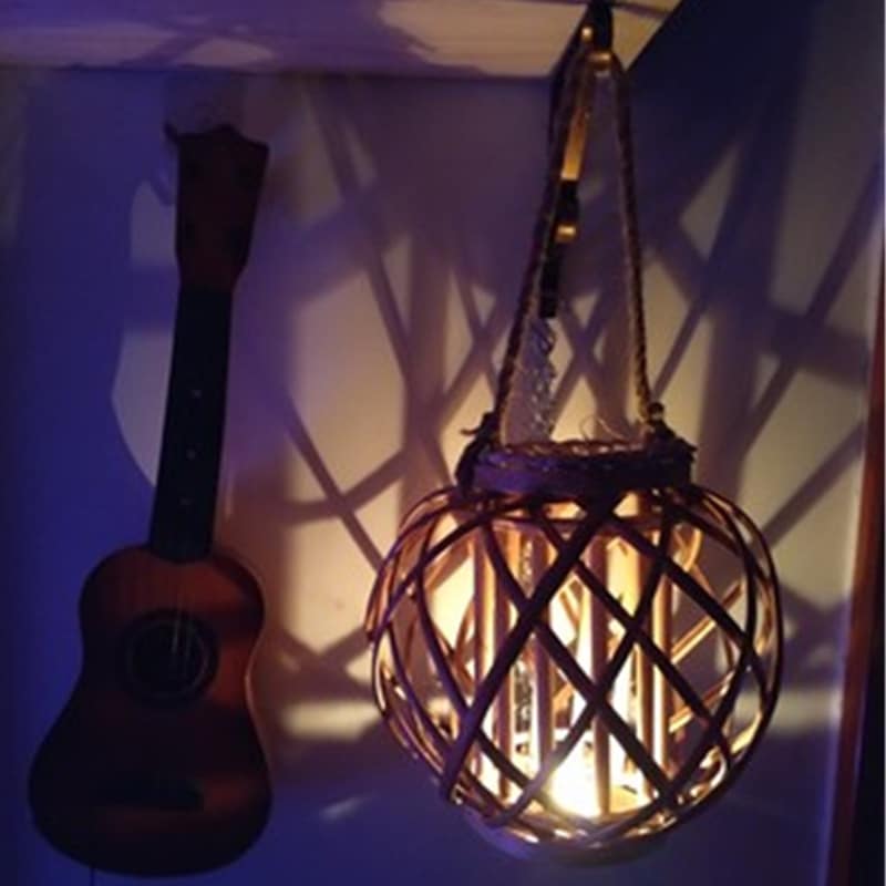 Square retro hand woven rattan lantern with a spiral woven rope