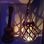 Square retro hand woven rattan lantern with a spiral woven rope