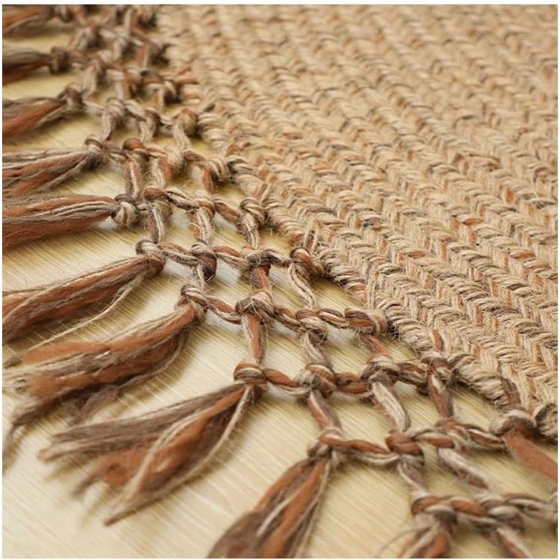Round jute rug with a looped openwork fringe