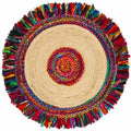 Round jute rug with a multicolor braided center and fabric fringe