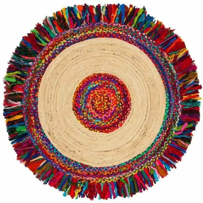 Round jute rug with a multicolor braided center and fabric fringe