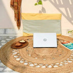 Round reversible jute rug with an openwork border