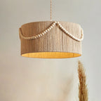 Drum pendant wrapped in natural rope with wooden bead garland