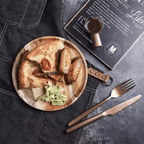 Round acacia wood plate with a contrasting natural grain