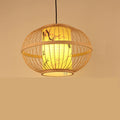 Round woven bamboo lantern pendant with glowing inner shade