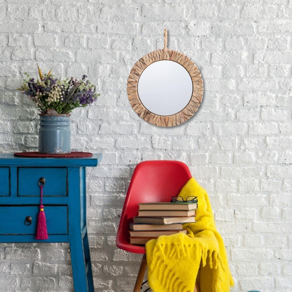 Round mirror with thick braided natural frame and rope hanger