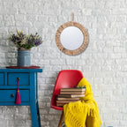 Round mirror with thick braided natural frame and rope hanger