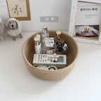 Round white cotton rope storage baskets on a vanity