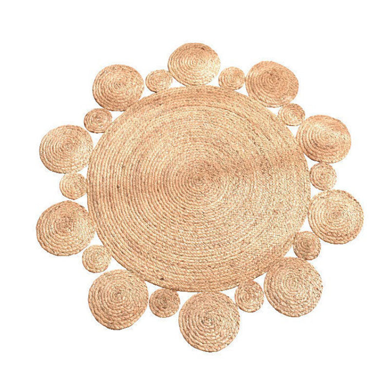 Round jute rug edged with braided bubbles