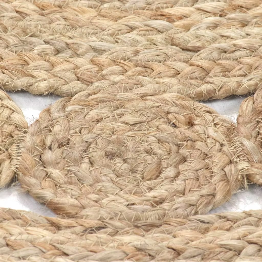 Round jute rug with a ring of braided medallions